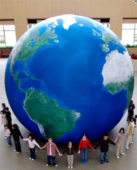 image of students around an Earth Balloon